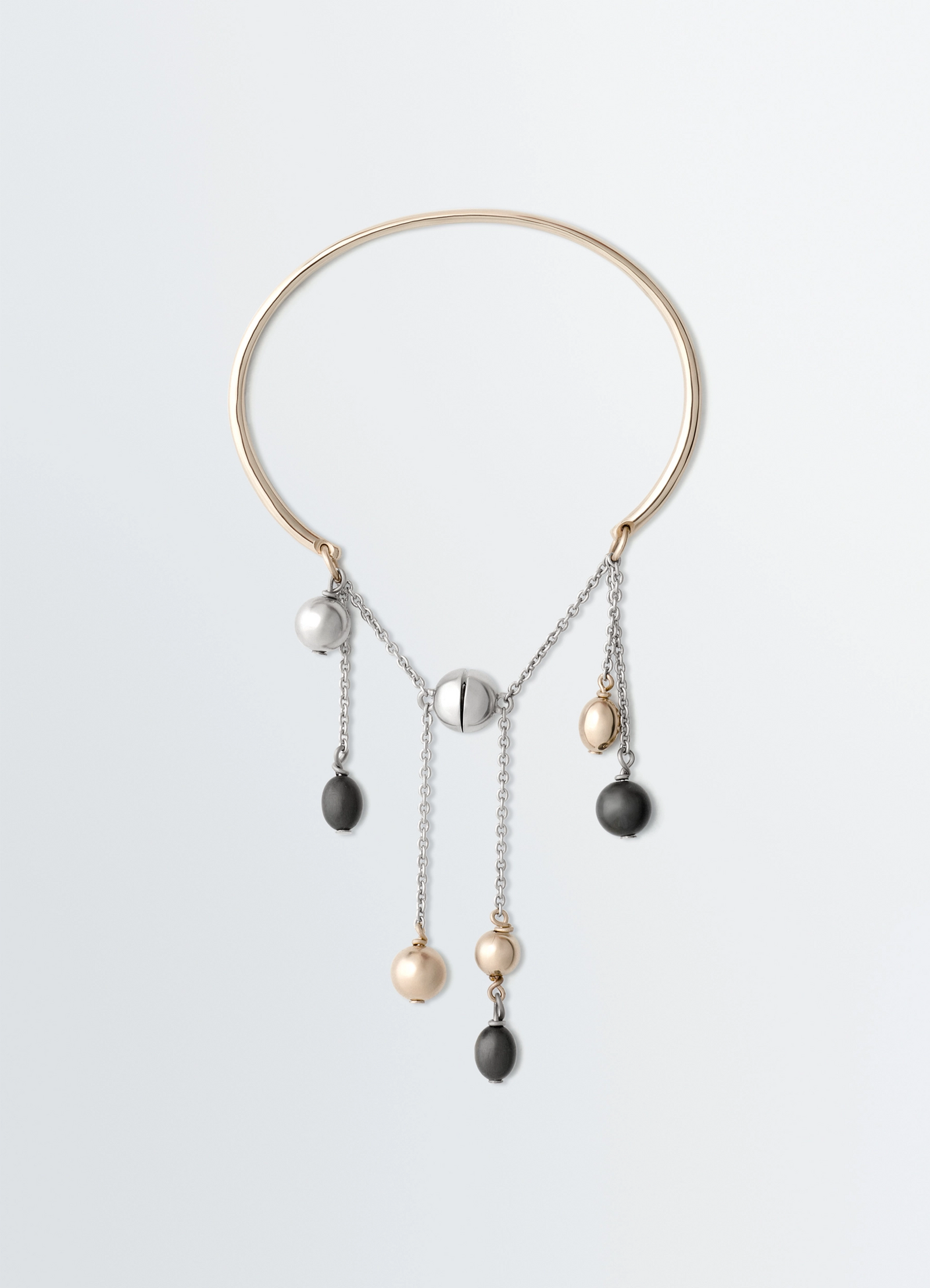 Seeds bracelet in mixed metals, product shot, front view articulated seed cluster