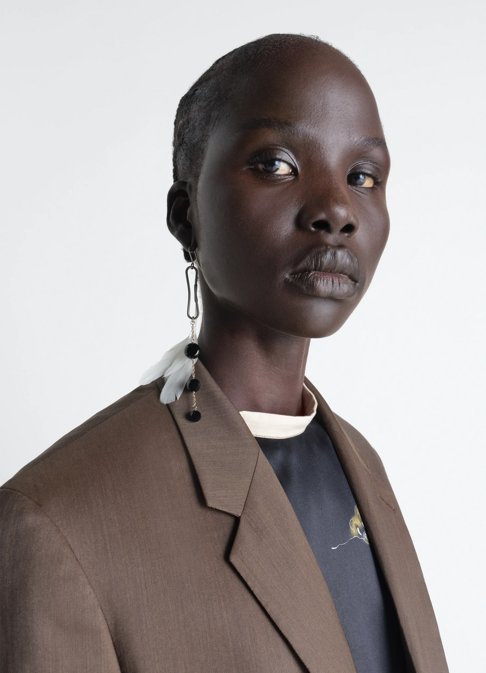 Dot Earring with Onyx and Rooster F in Sterling Silver, Onyx, model shot, three-quarter view dangling elements