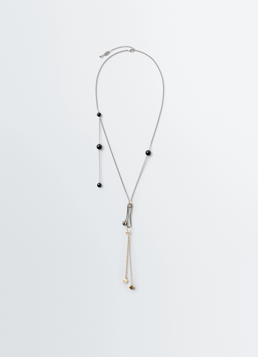 Thistle Necklace in Silver and Gold Metal, product shot, Front view Delicate Thistle Form