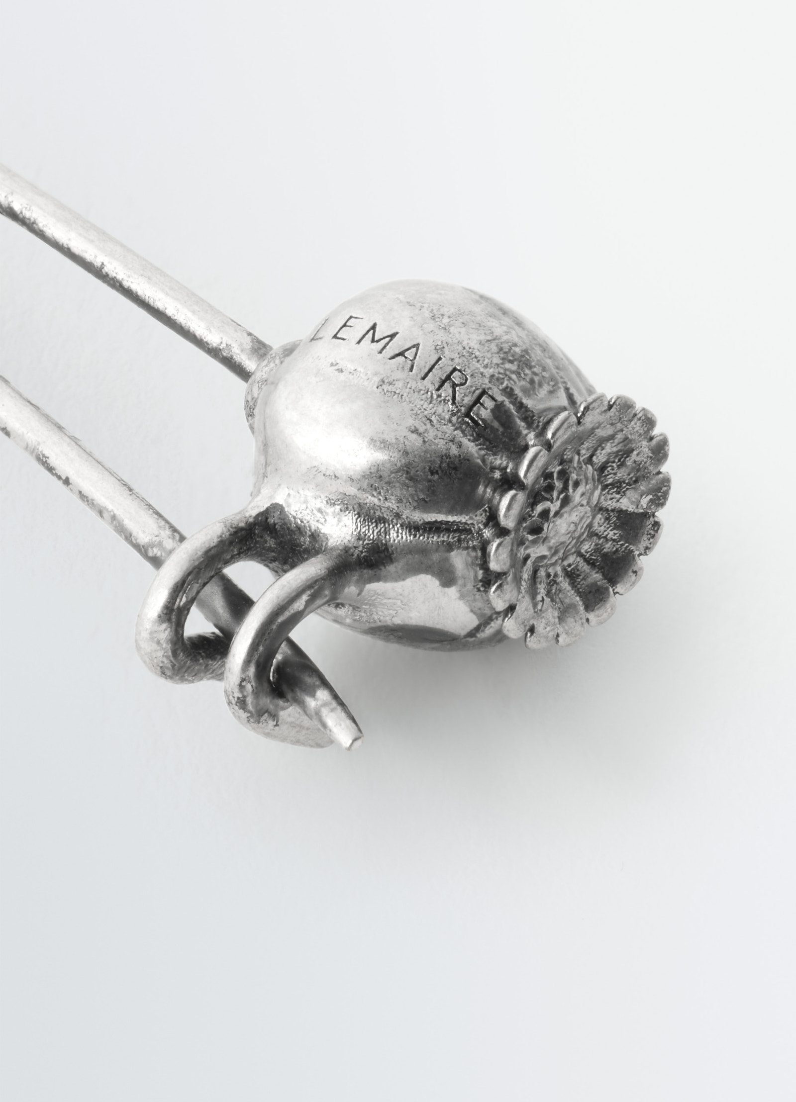 Thistle pin brooch in brass, product shot, detailed close-up view intricate thistle texture