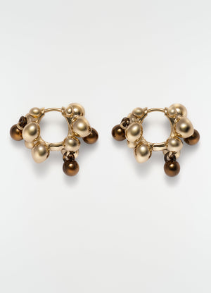 Seeds hoop earrings in gold-tone brass with brown beads by lemaire, plain white background close-up