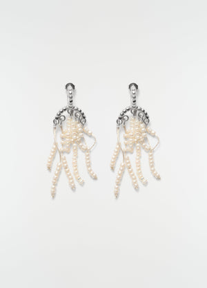 Short silver and white glass bead tassel earrings lemaire front on plain white background