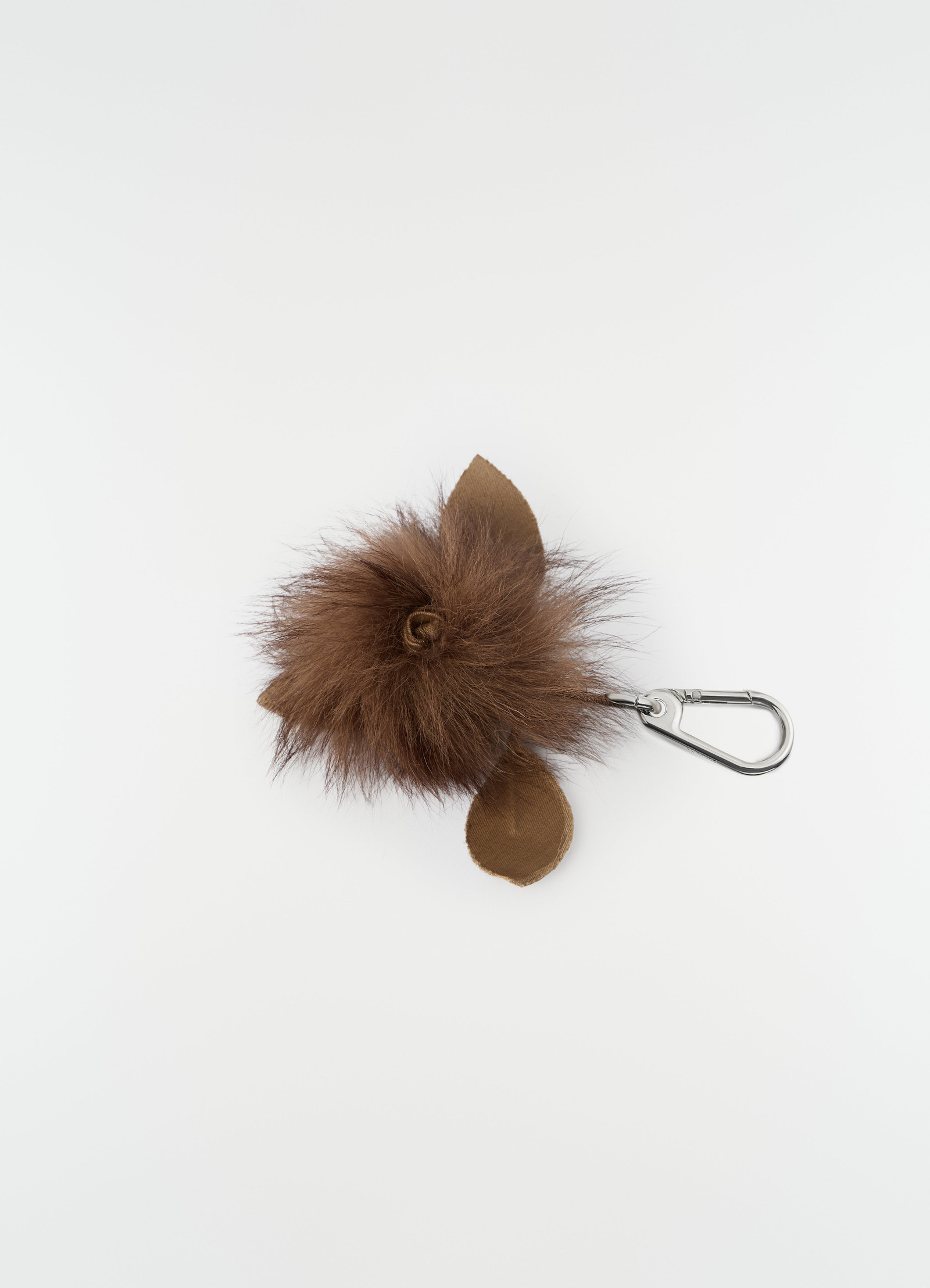 Fuzzy brown rose brooch in lambskin shearling with silver clip by lemaire on plain white background