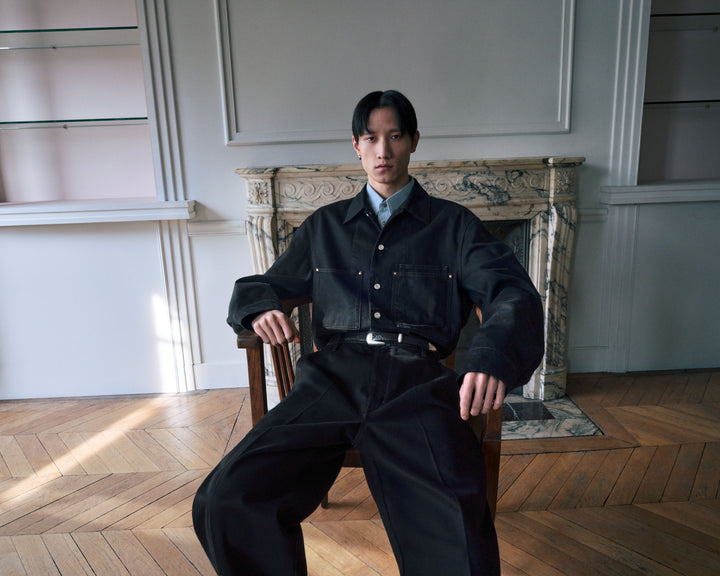 Black denim outfit in black denim, model shot, front view loose fit