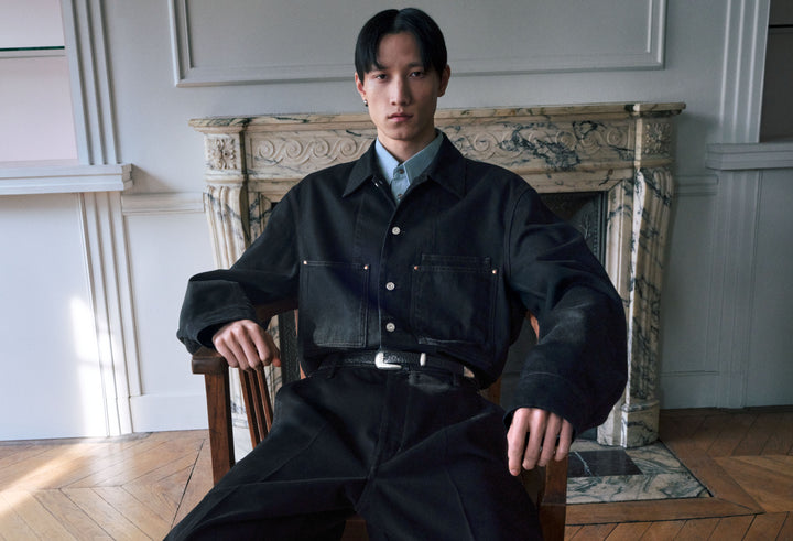 Black denim jacket in black denim, model shot, front view loose fit, large pockets