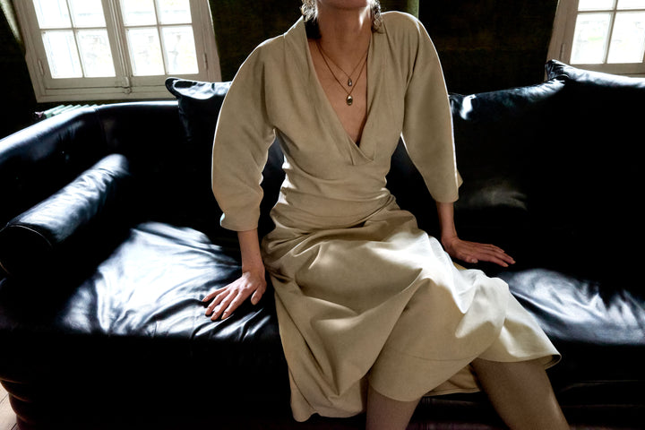 Beige dress in Beige fabric, model shot, Front view V-neck, long sleeves