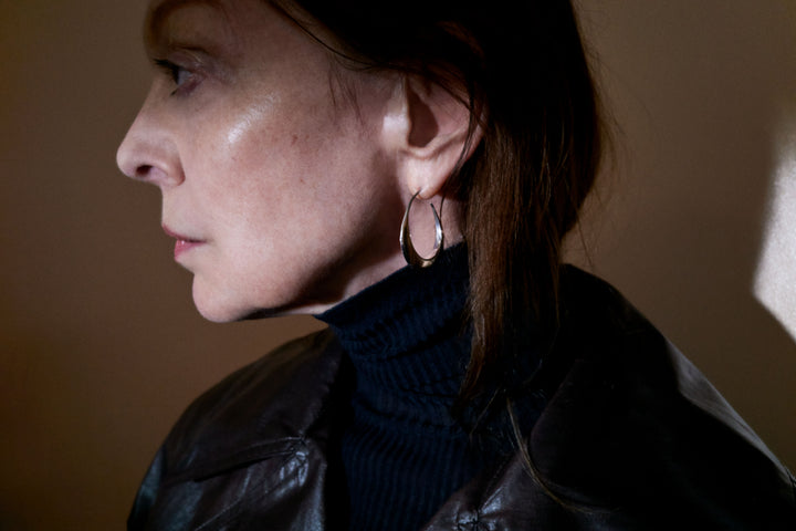 Leather jacket in Dark brown leather, model shot, Side view Fitted design