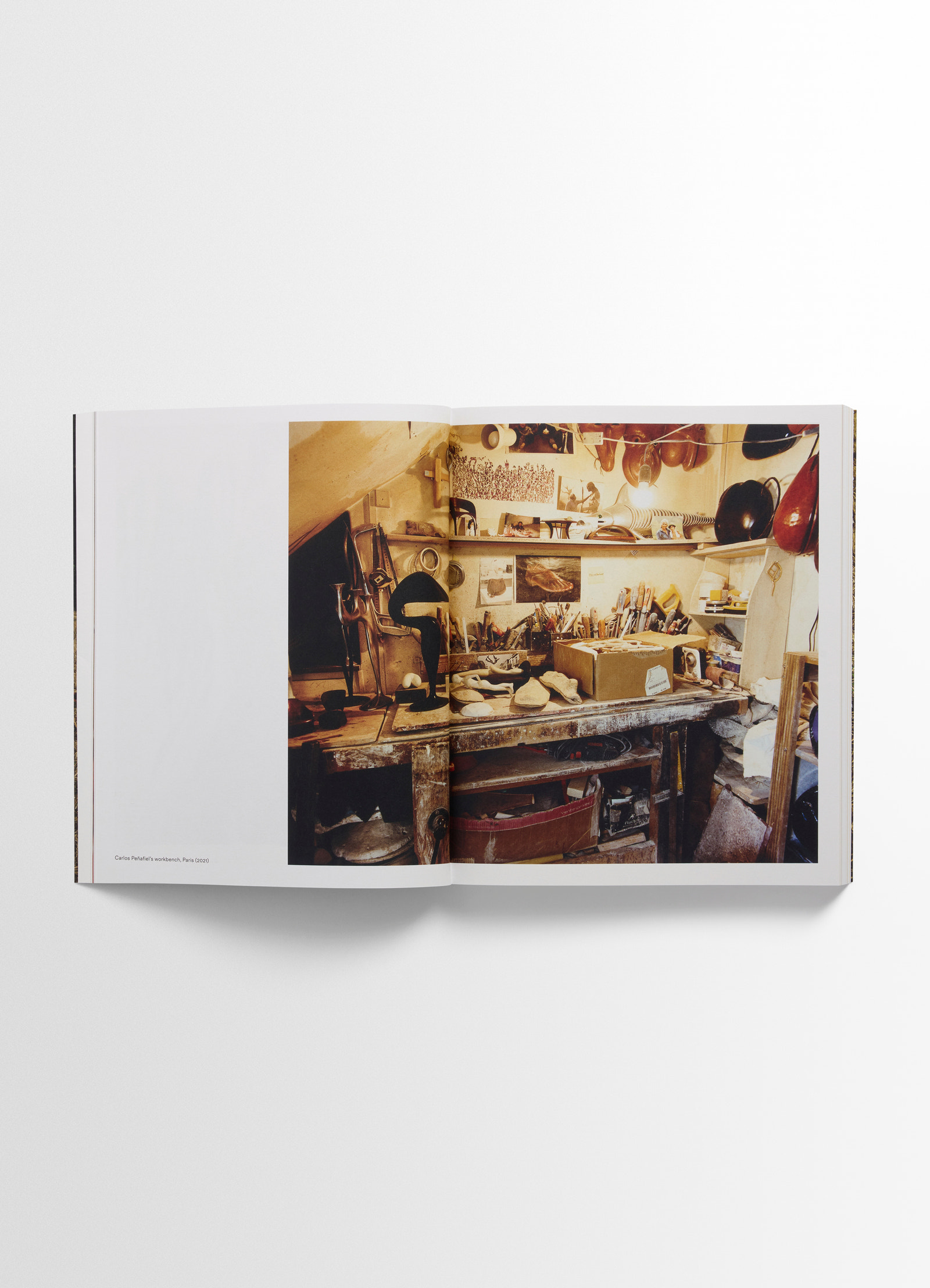 Carlos peñafiel book in molded leather, product shot, side open display interior page detail