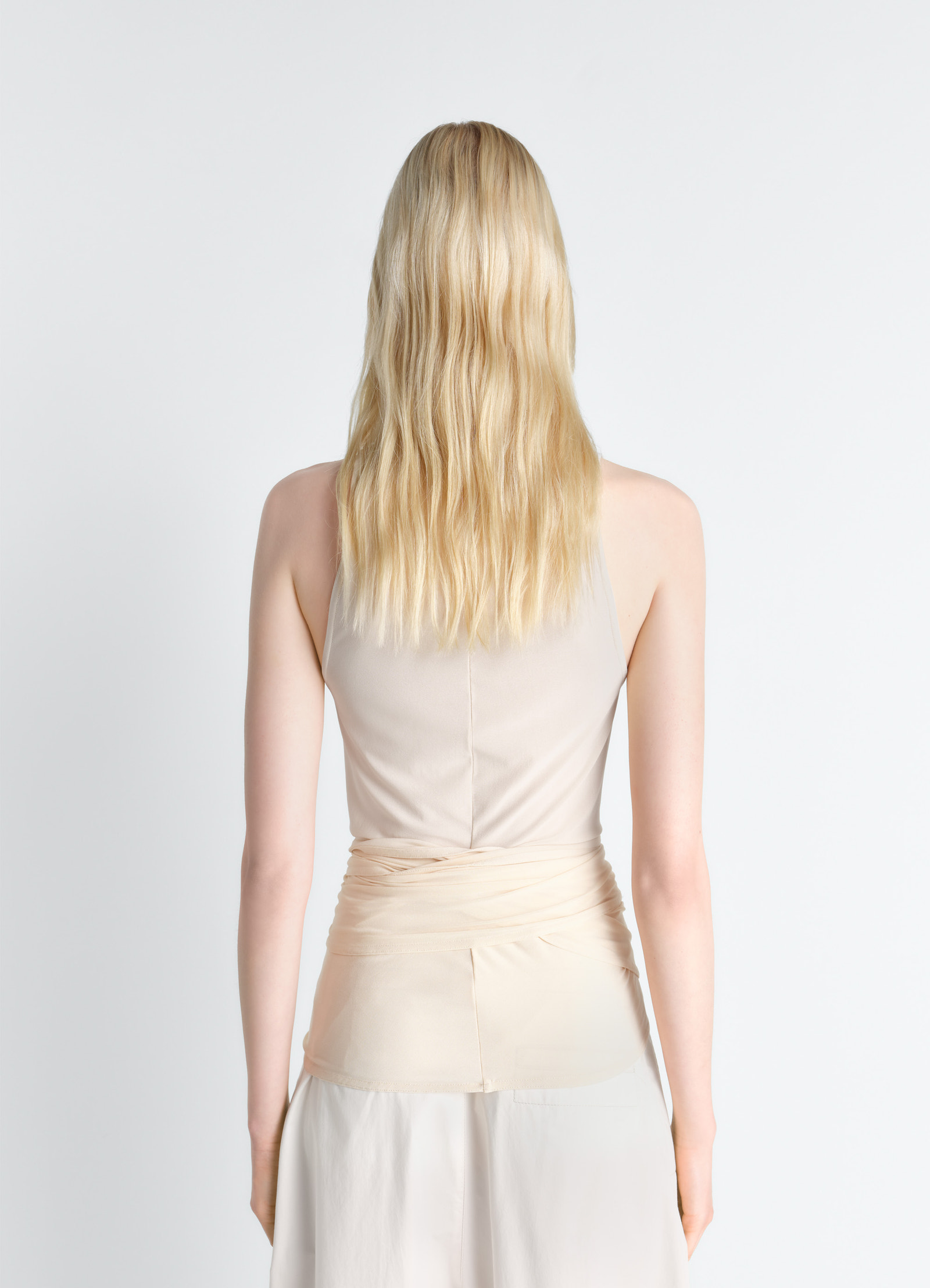 Sleeveless wrap top in viscose crepe jersey, model shot, back view smooth fitted back