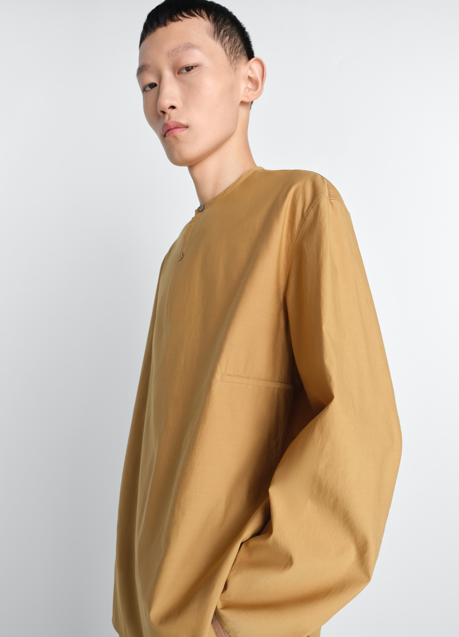 Vareuse top in washed cotton silk, model shot, three-quarter view dropped shoulders