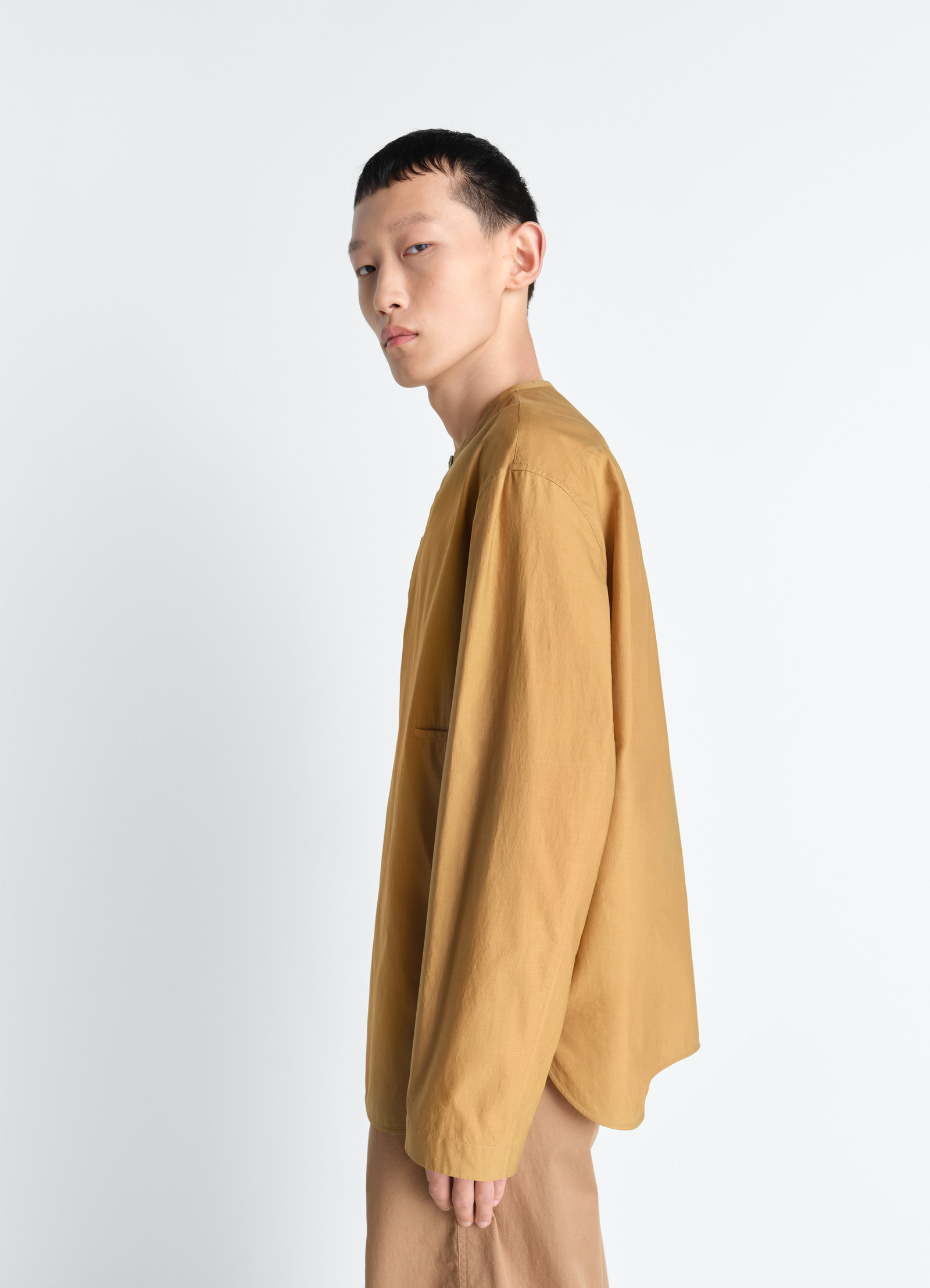 Vareuse top in washed cotton silk, model shot, side view relaxed long sleeves