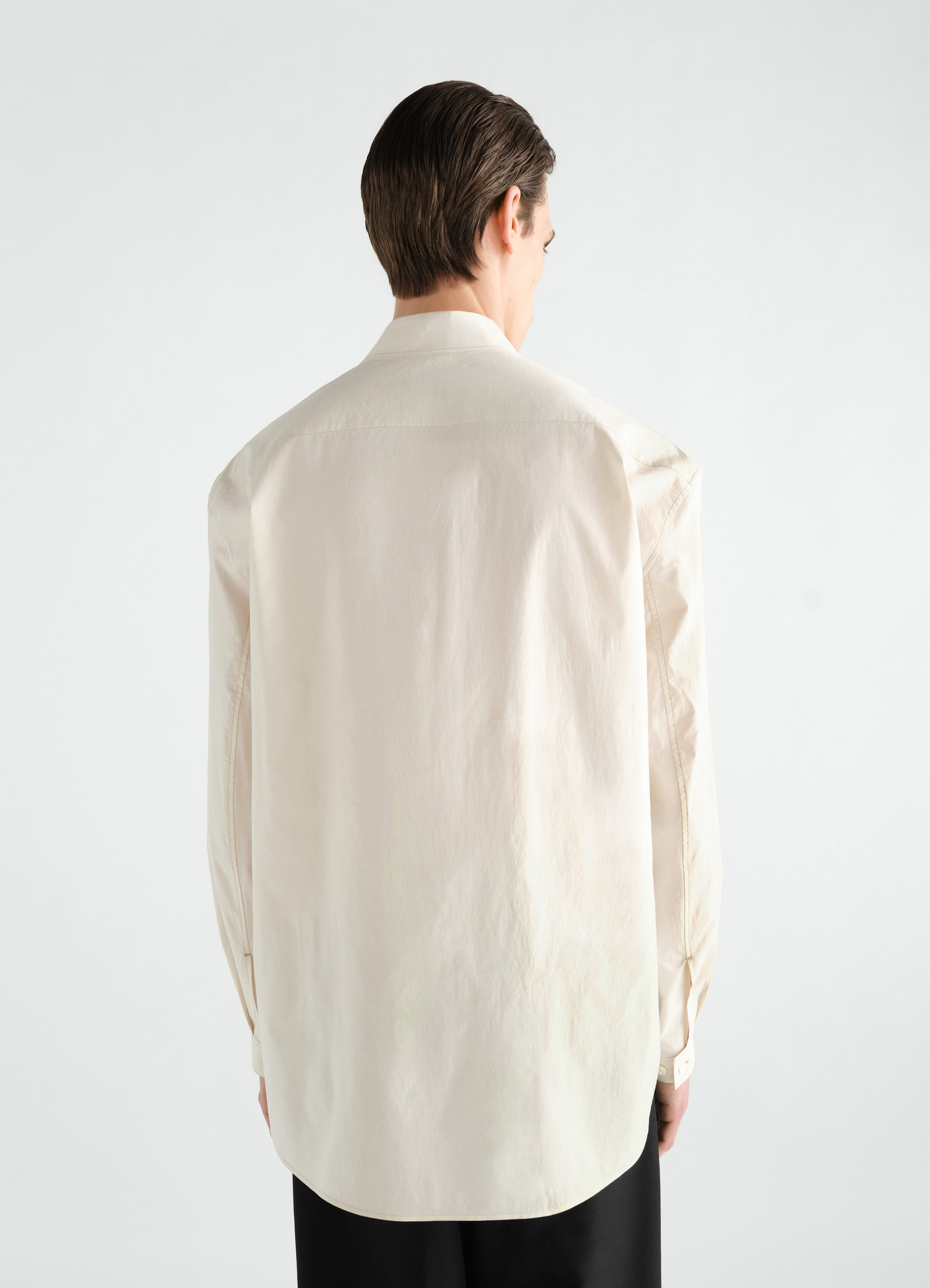 Sailor top in washed cotton and silk blend off-white worn by a model back view lemaire