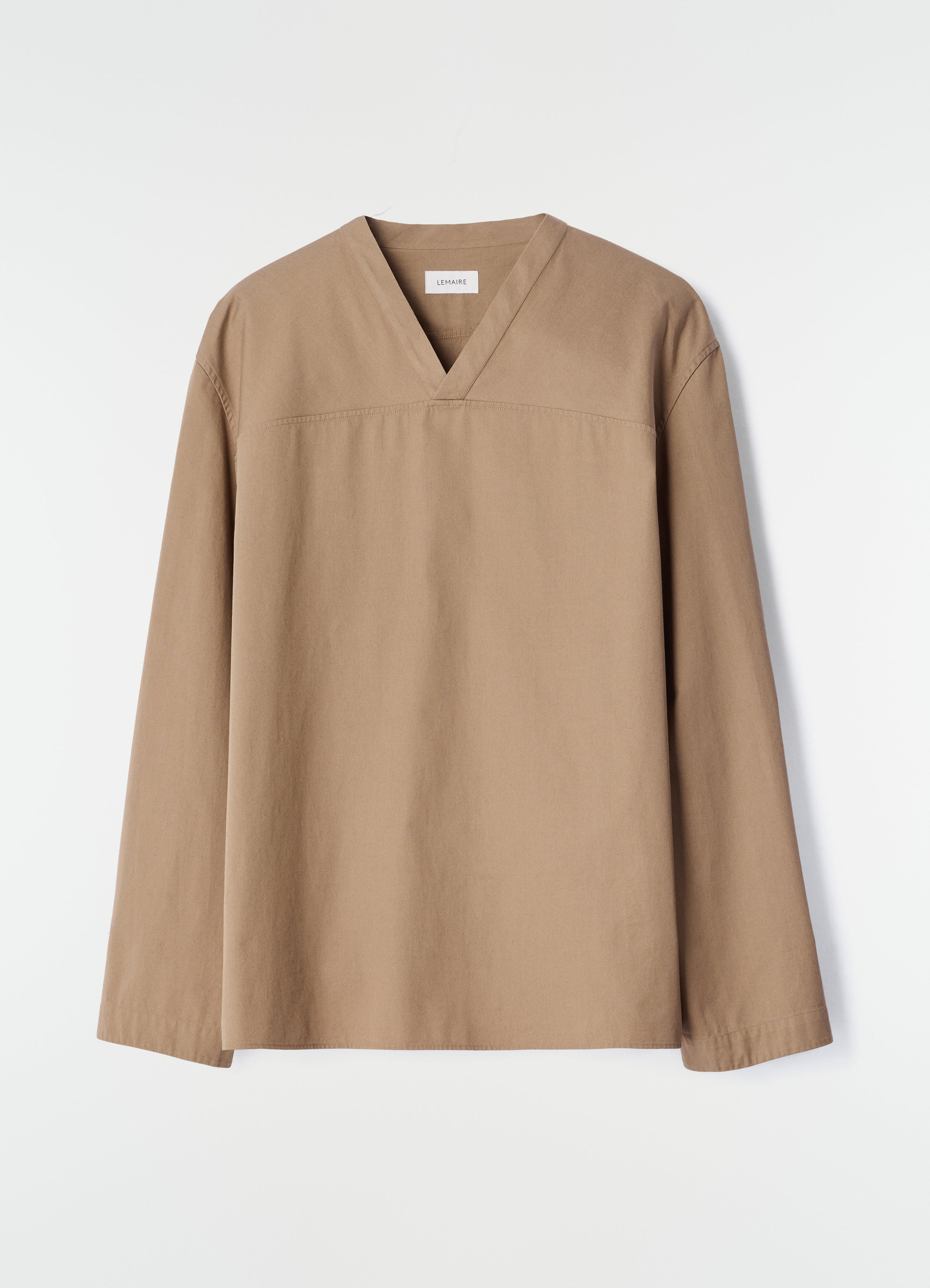 V-neck light brown cotton twill top lemaire flat lay front view on white background