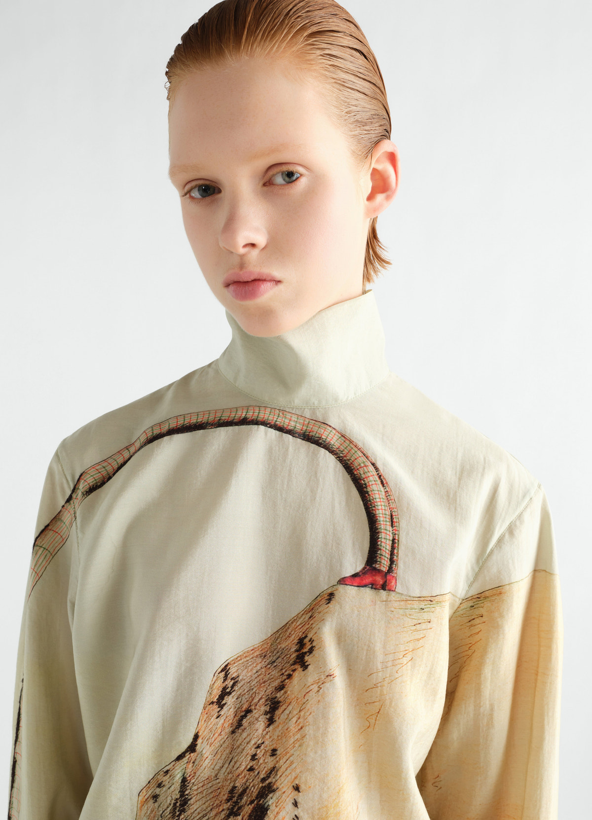 Stand-collar printed dry silk top in beige with abstract design by lemaire worn by model front close-up