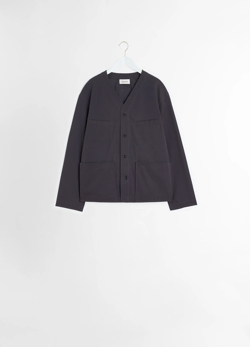 Collarless Overshirt in Compact Cotton Twill, product shot, dangling hanger view minimalist button-up design