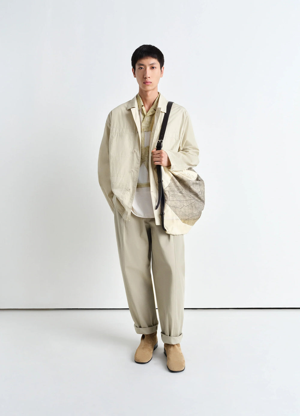 Workwear Shirt Jacket in Lightweight Cotton Poplin, model shot, three-quarter view cuffed sleeves