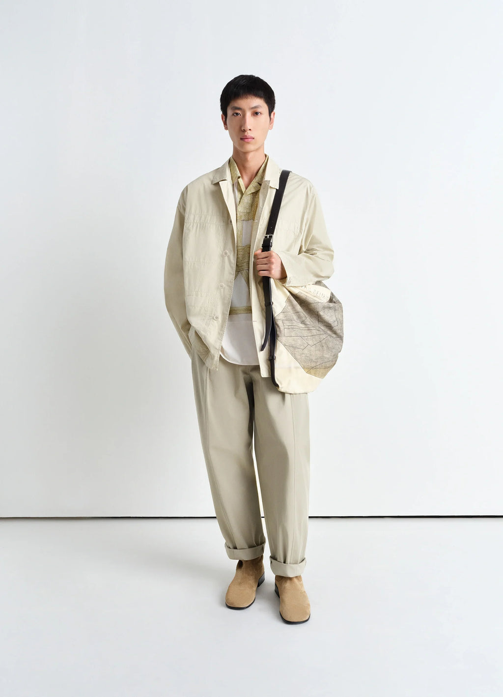 Workwear Shirt Jacket in Lightweight Cotton Poplin, model shot, three-quarter view cuffed sleeves