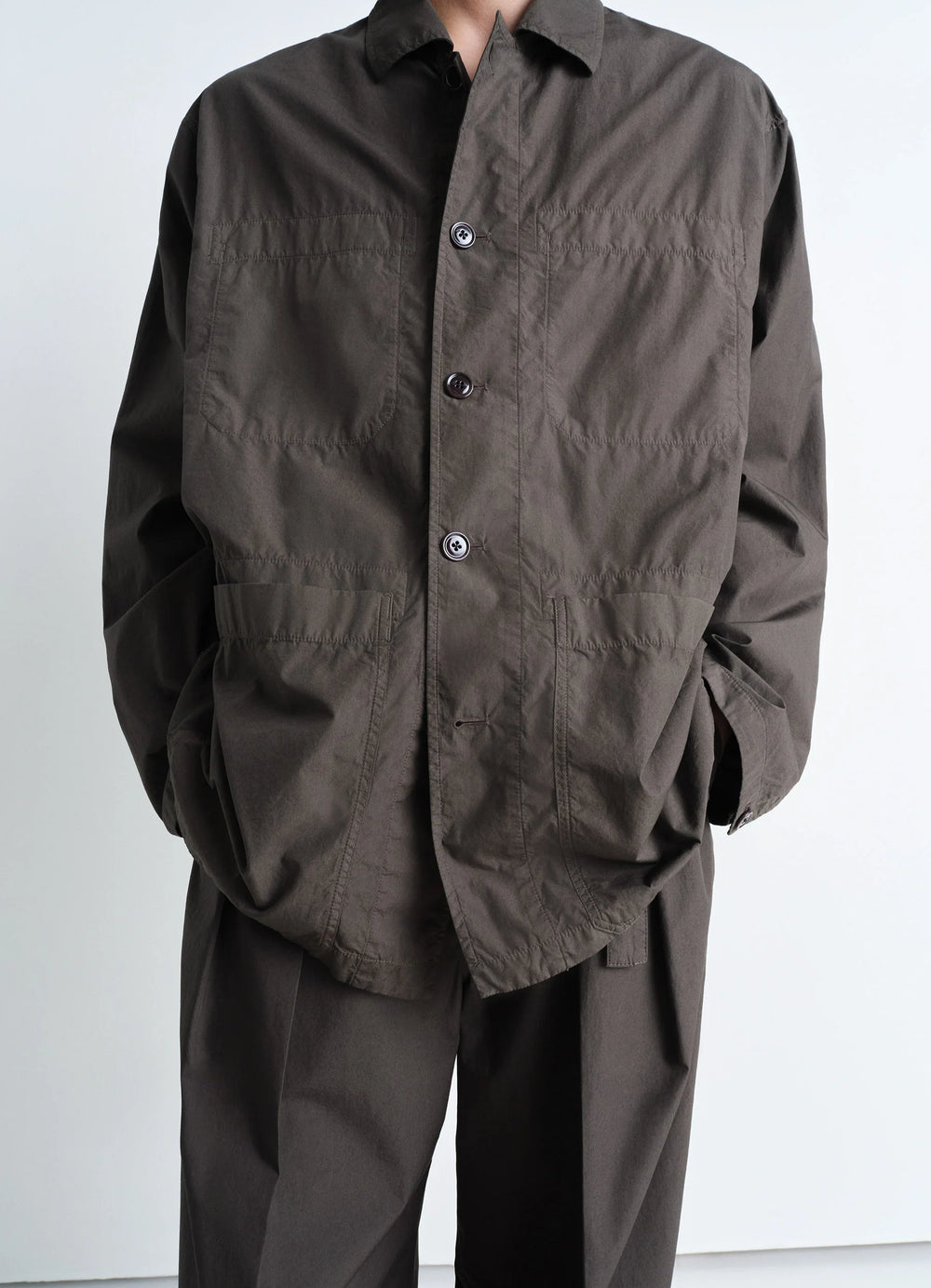 Workwear Shirt Jacket in Lightweight Cotton Poplin, model shot, close-up midsection boxy fit with flap pockets