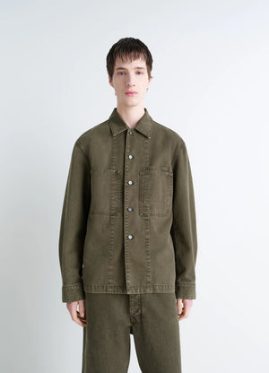 Lemaire Workwear Overshirt in Garment Dyed Snowy Denim, model shot, front view fitted cut, patch pockets