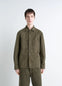 Lemaire Workwear Overshirt in Garment Dyed Snowy Denim, model shot, front view fitted cut, patch pockets