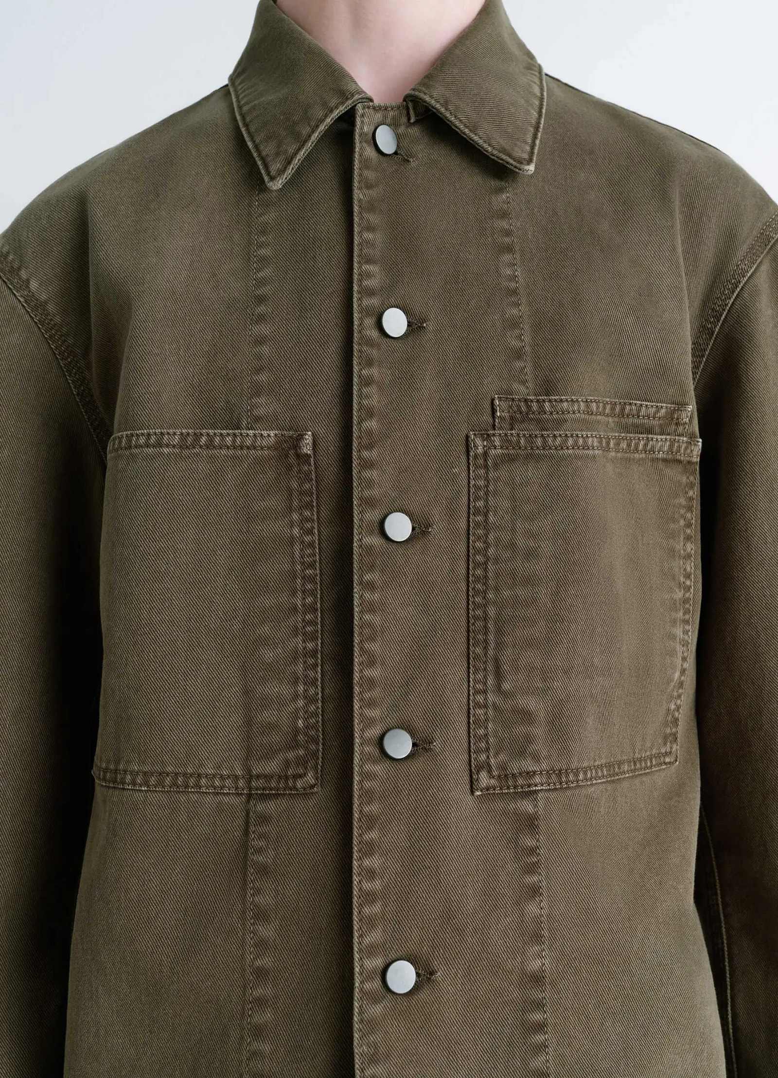 Lemaire workwear overshirt in garment dyed snowy denim, model shot, detail shot collar stitching detail