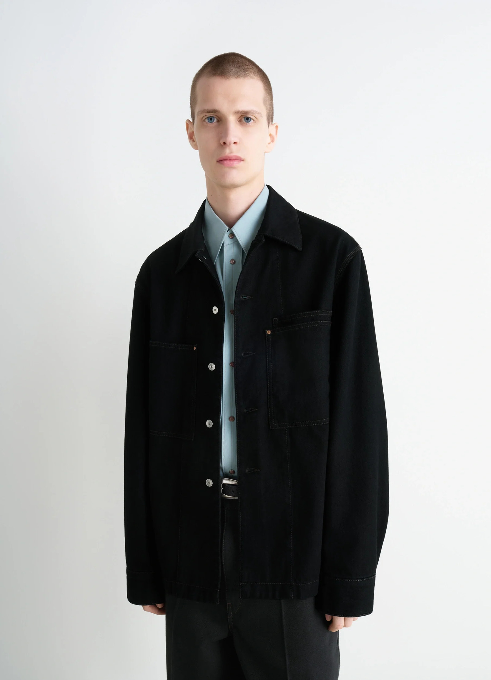 Lemaire workwear overshirt in deep black medium-weight denim, model shot, front view relaxed fit