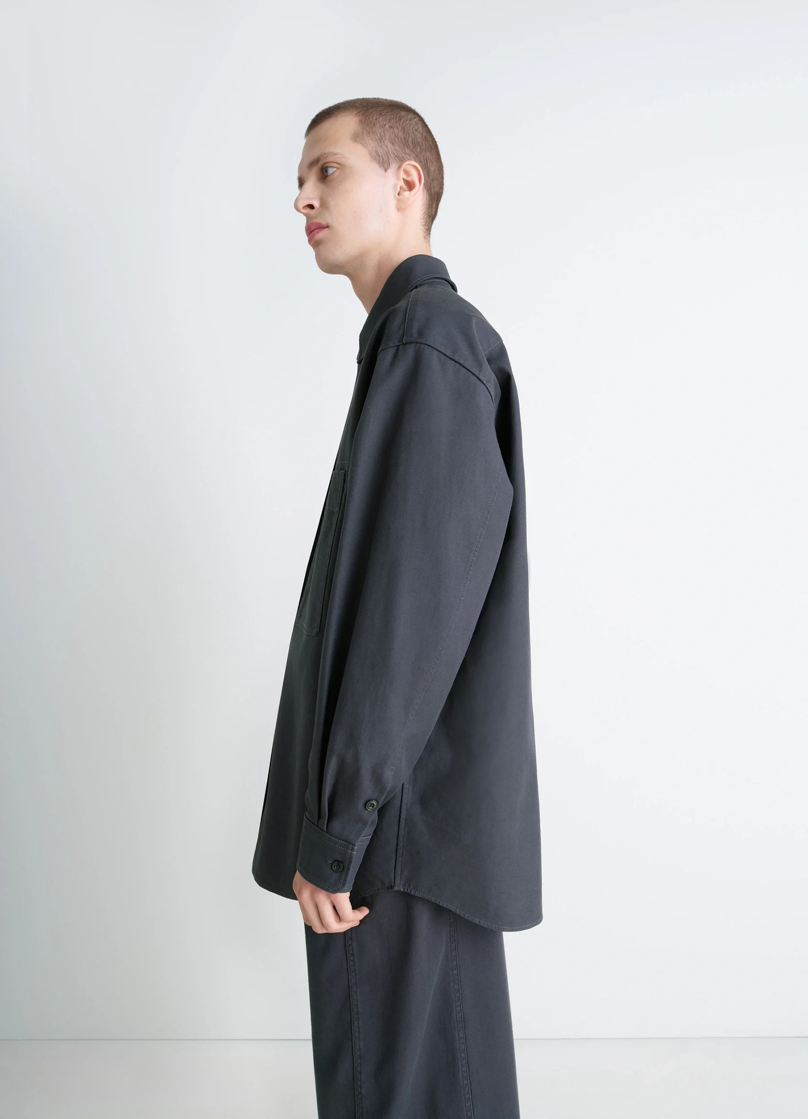 Utility overshirt in thick cotton twill, model shot, side view long sleeves