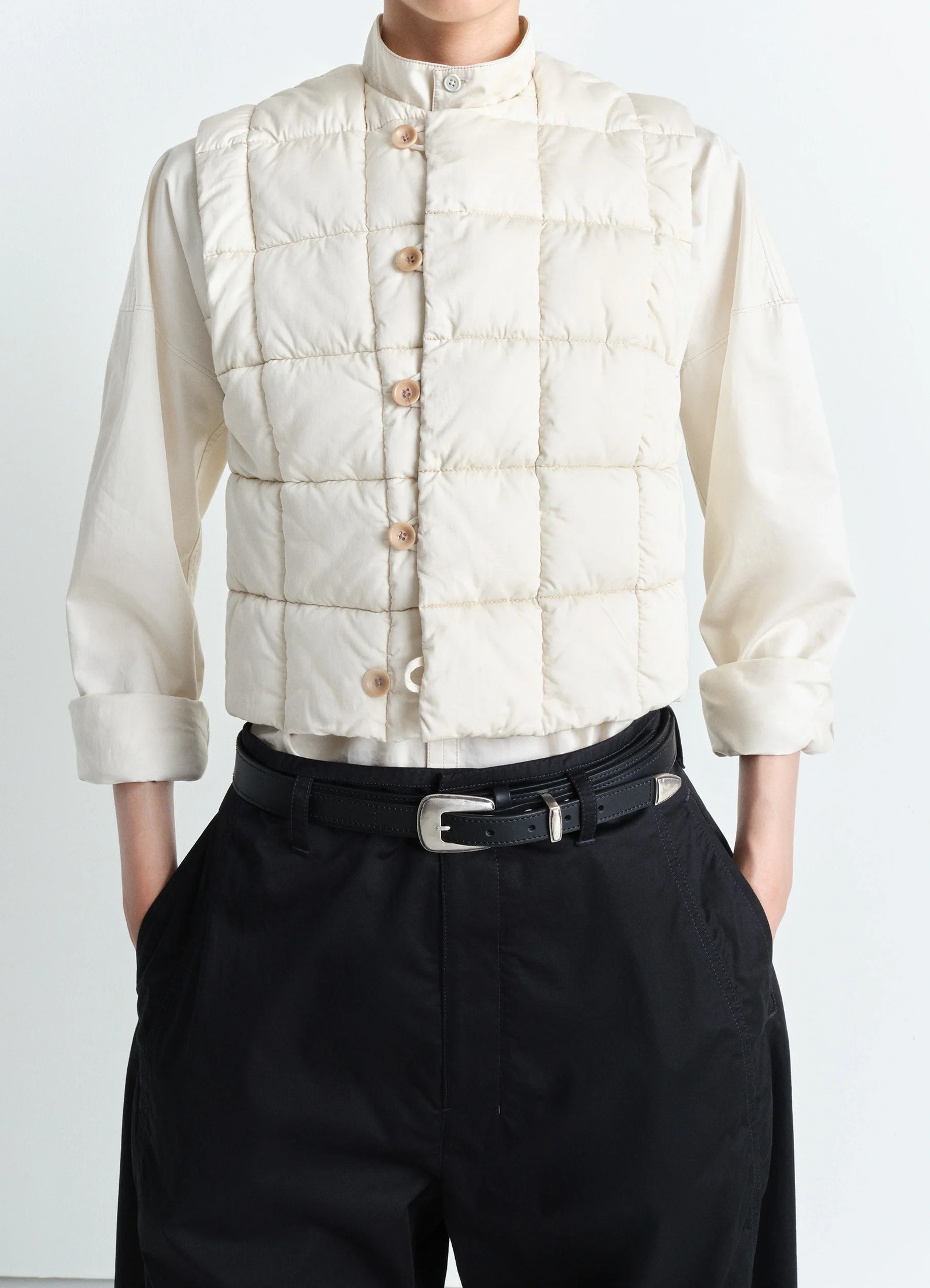 Lemaire wadded gilet in light cotton satin, model shot, front view quilted texture visible