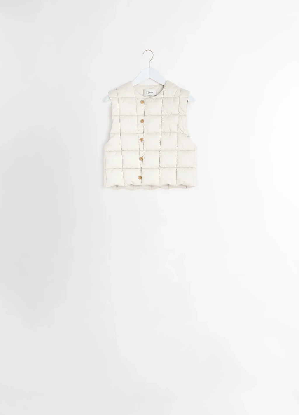 Lemaire Wadded Gilet in Light Cotton Satin, product shot, back view quilted pattern, hung on hanger
