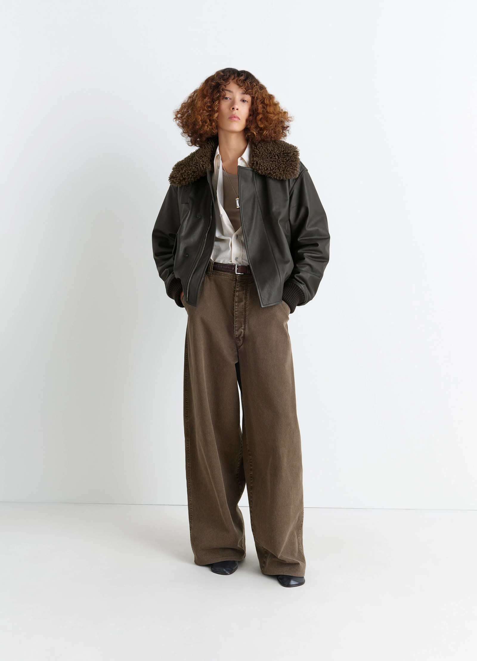 Lemaire leather blouson in nappa cow leather shearling, model shot, three-quarter view shearling collar open