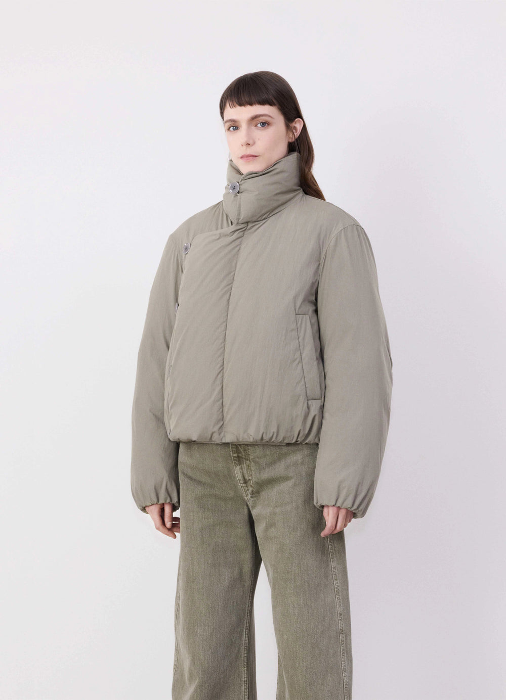 Lemaire Short Puffer Blouson in Light Cotton Blend, model shot, Front side angle Rounded silhouette