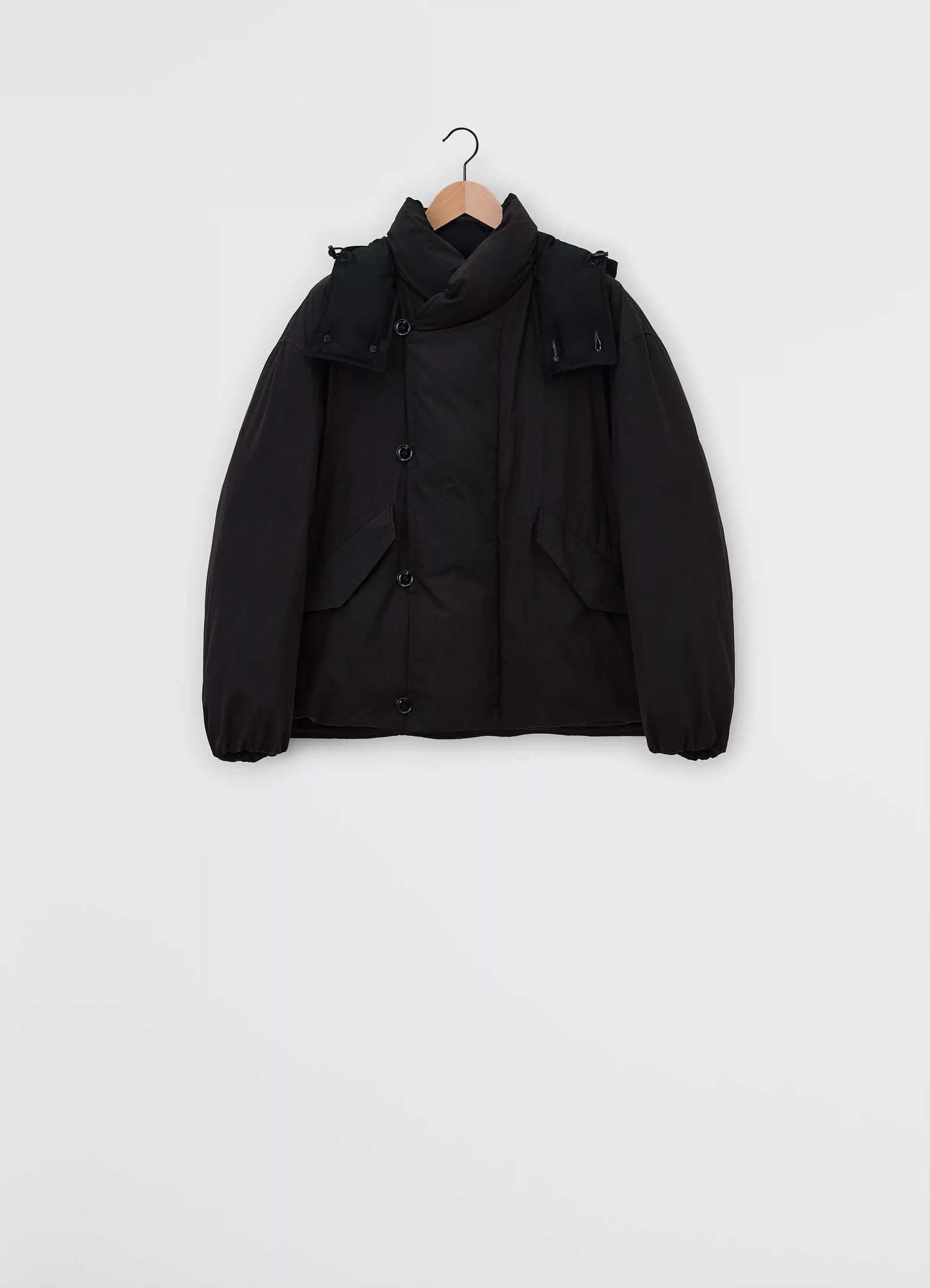 Lemaire hooded puffer blouson in dark cotton blend, product shot, back view button closure, elastic cuffs