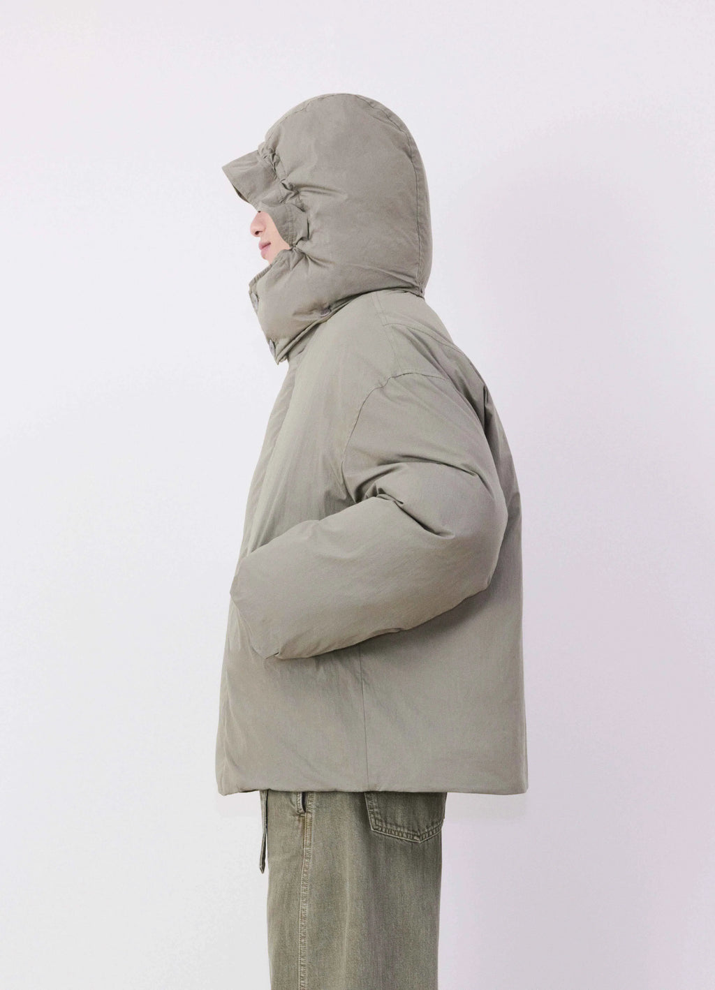 Lemaire Hooded Puffer Blouson in Light Cotton Blend, model shot, side profile view padded shoulders