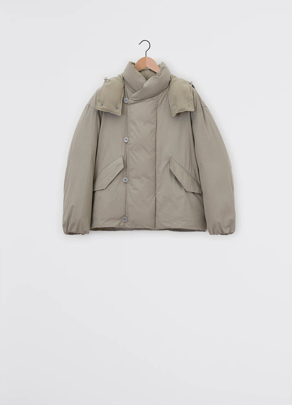 Lemaire Hooded Puffer Blouson in Light Cotton Blend, product shot, hanging perspective buttoned storm flap