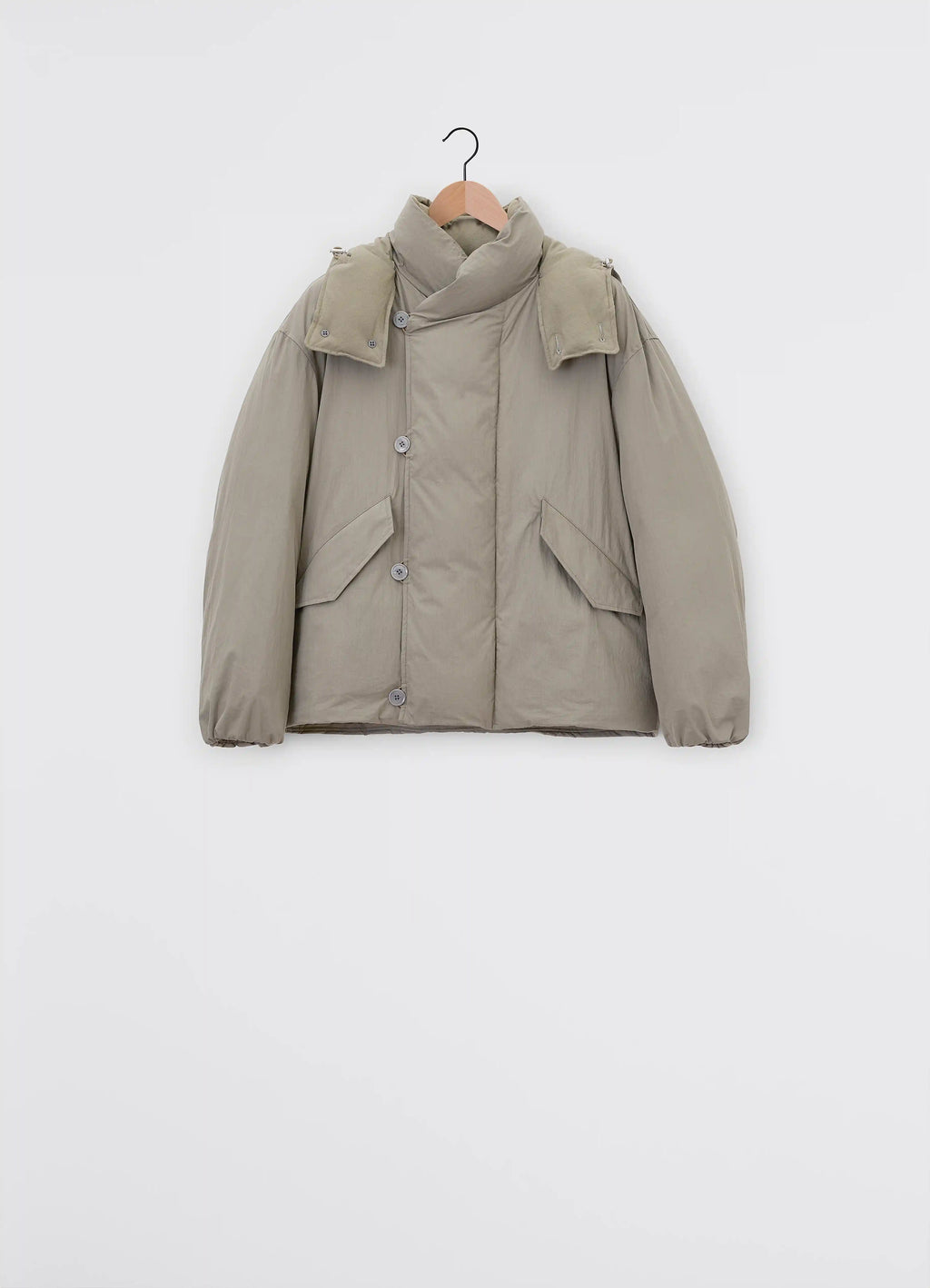 Lemaire Hooded Puffer Blouson in Light Cotton Blend, product shot, hanging perspective buttoned storm flap