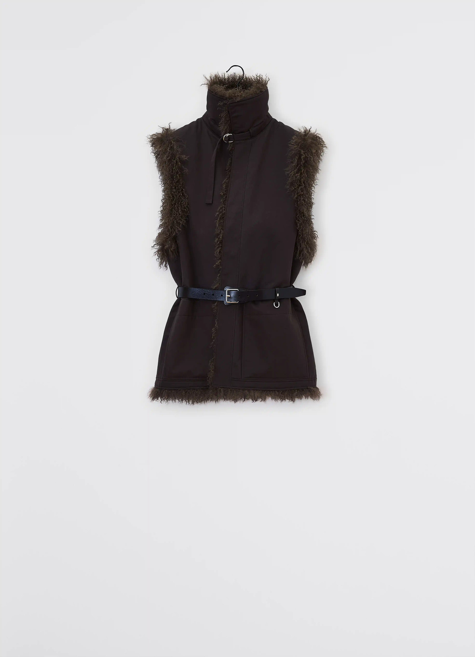 Lemaire reversible belted long shea in dark shearling and cotton twill, product shot, back view sleeveless with belt