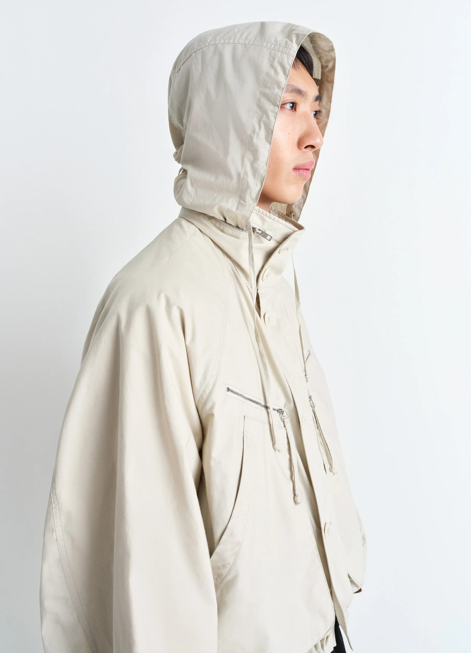 Parachute blouson in ventile® cotton, model shot, side profile view hooded jacket detail