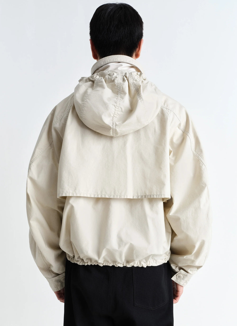 Parachute Blouson in VENTILE® cotton, model shot, back view overlapping shoulder flap