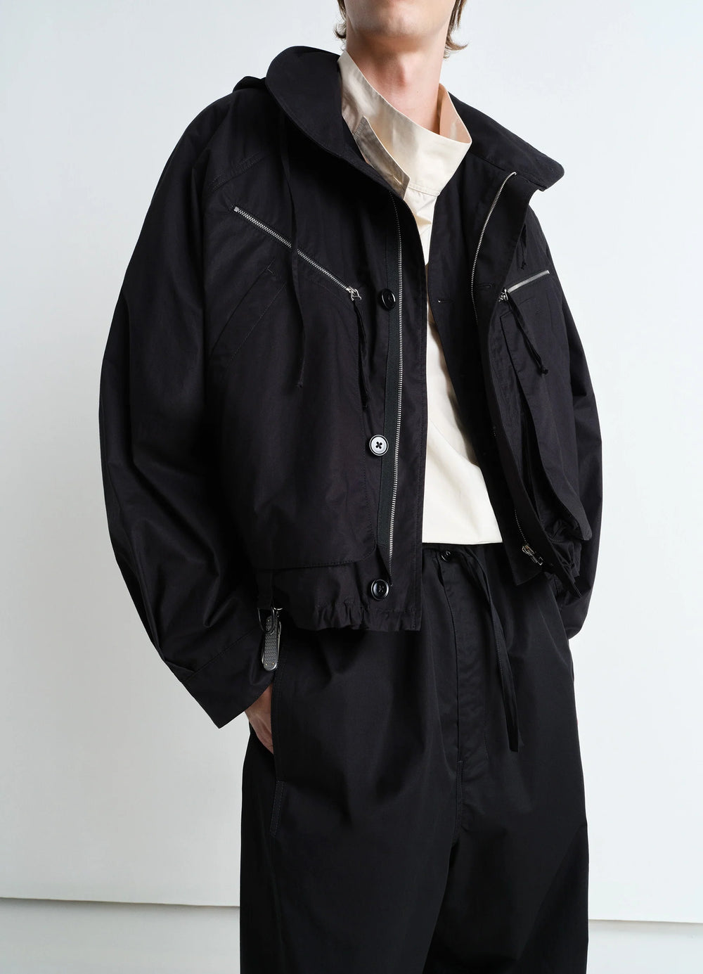 Parachute Blouson in Black VENTILE® Cotton, model shot, three-quarter front view dropped shoulders, adjustable hem