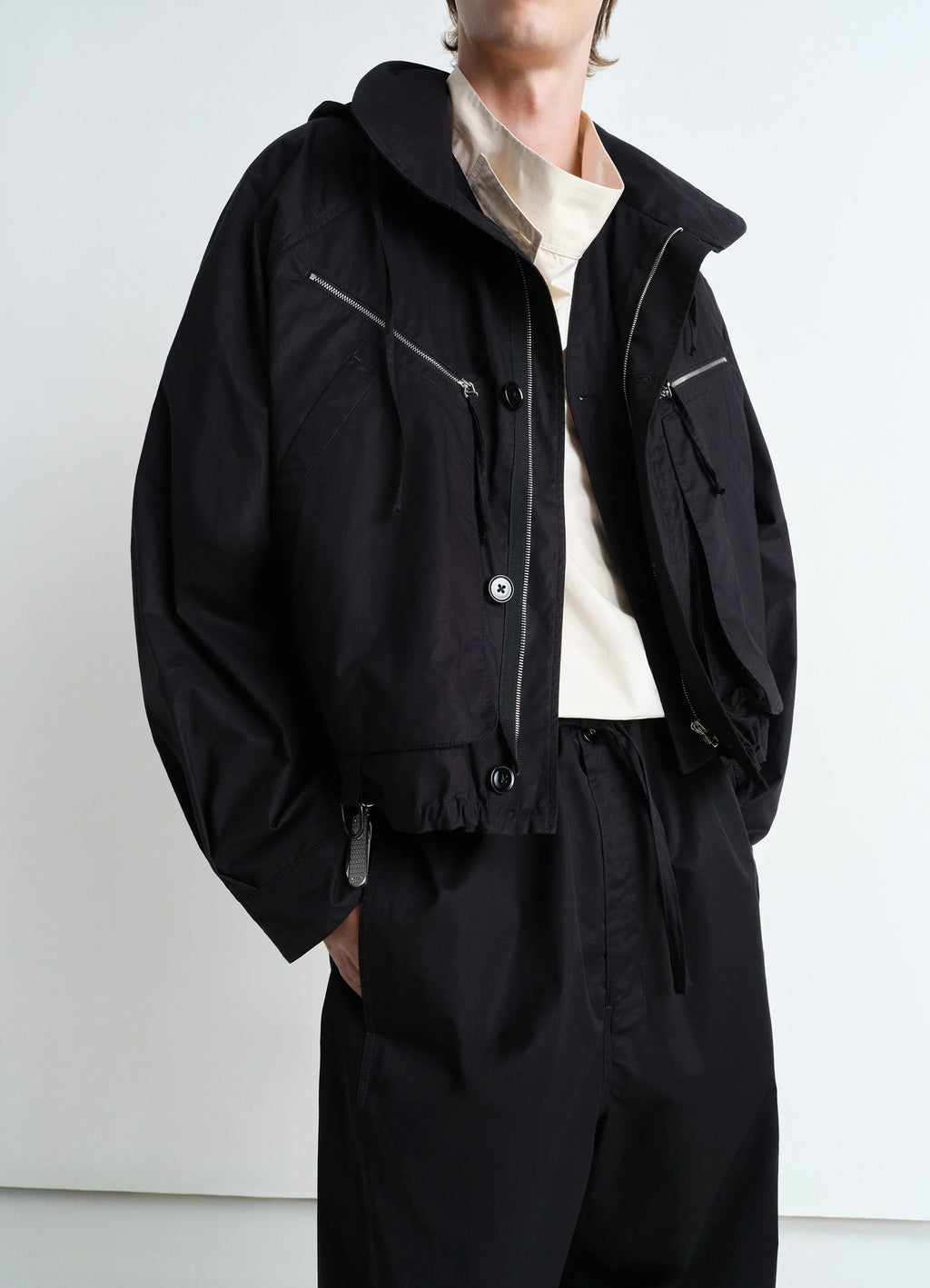 Parachute Blouson in Black VENTILE® Cotton, model shot, three-quarter front view dropped shoulders, adjustable hem