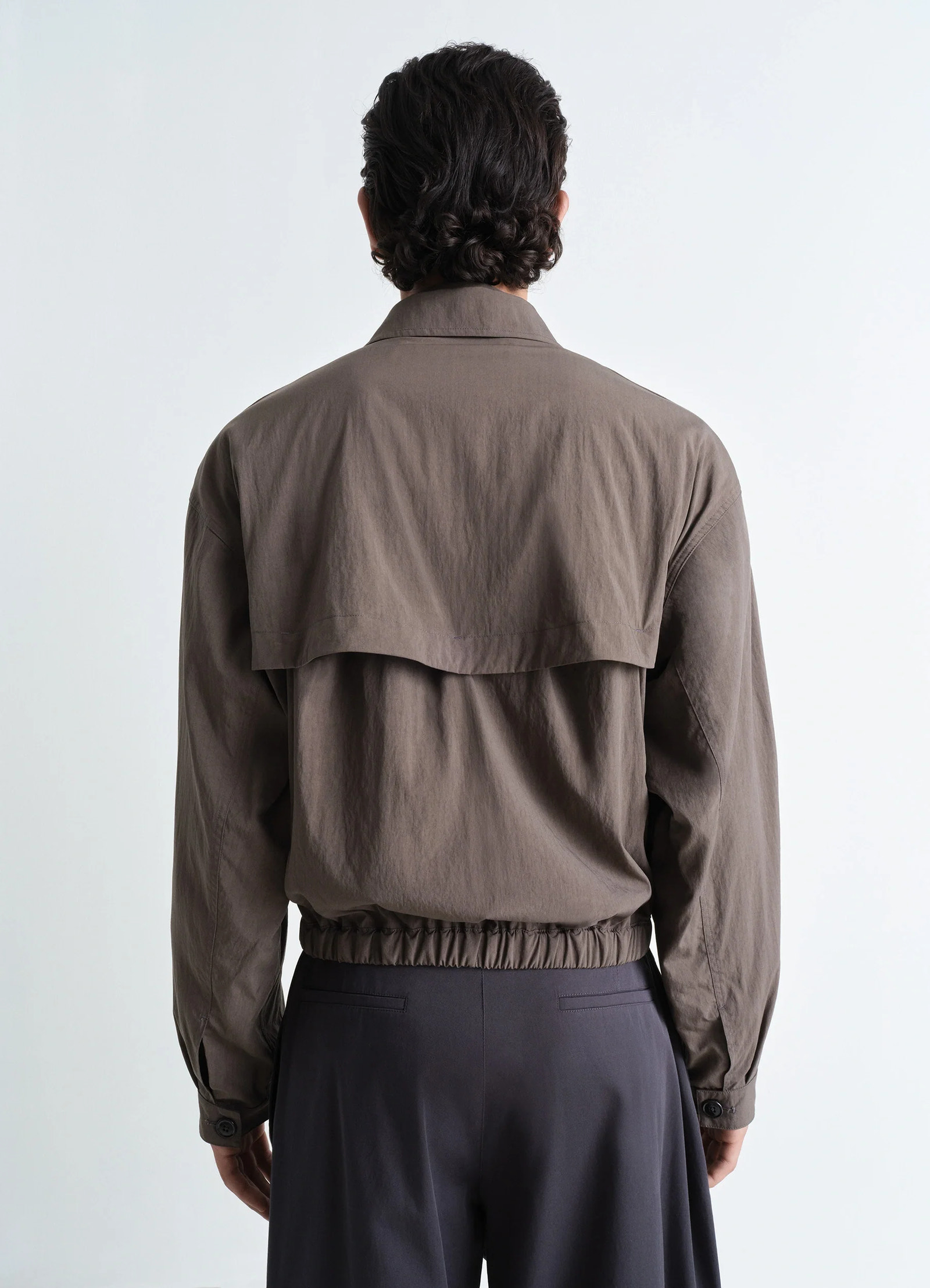 Zipped blouson in technical lyocell, model shot, back view vented back detail