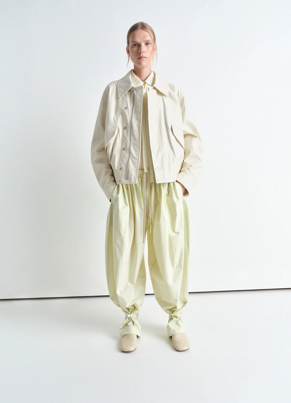 Philippe Weisbecker Bandana in 60 Green Houses Cotton, model shot, full body porte styled with light jacket