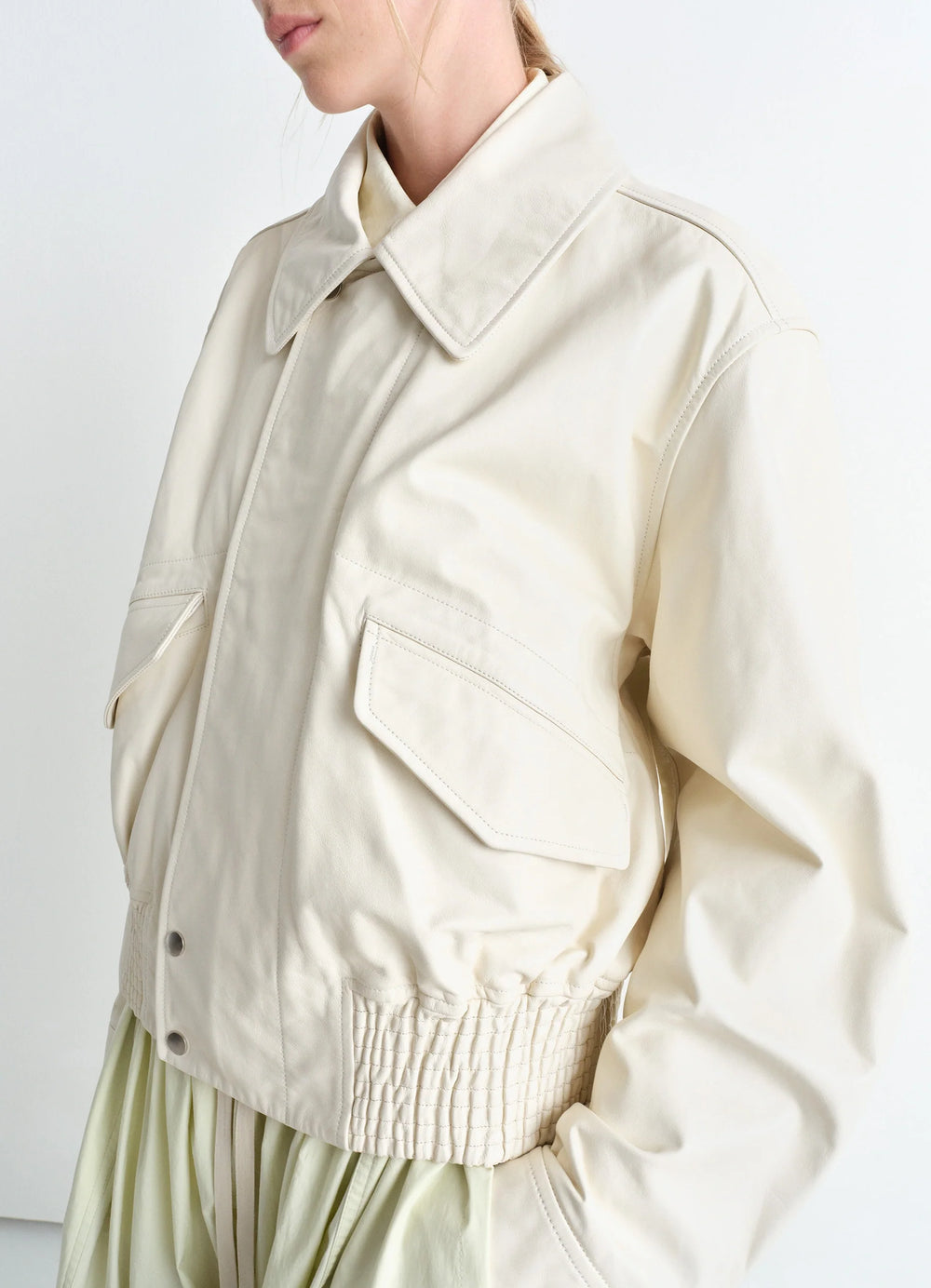 Lemaire Leather Blouson in Soft Nappa Cow Leather, model shot, side view exaggerated collar