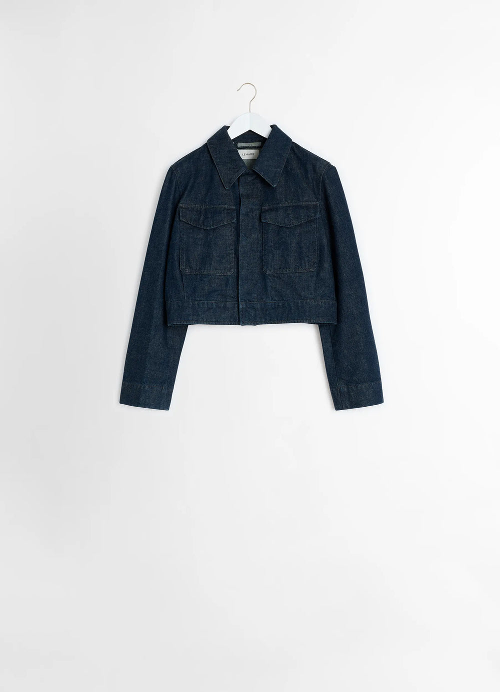 Lemaire Two Pocket Cropped Jacket in Deep Indigo Heavy Denim, product shot, hanging display classic collar, hemline details