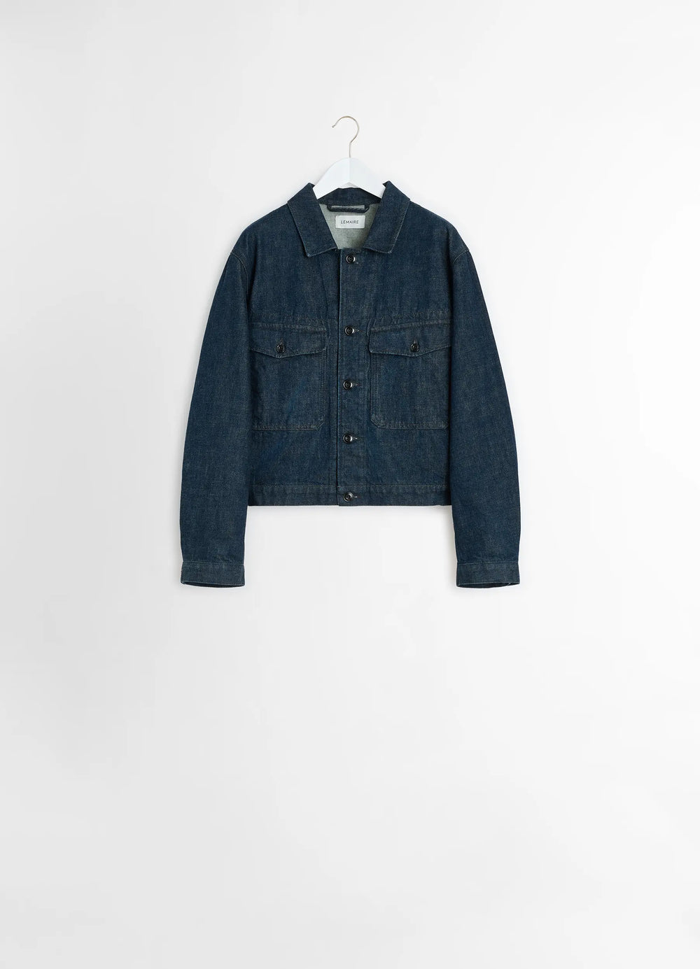 Lemaire Trucker Jacket in Deep Indigo Heavy Denim, product shot, hanging display shot flap chest pockets