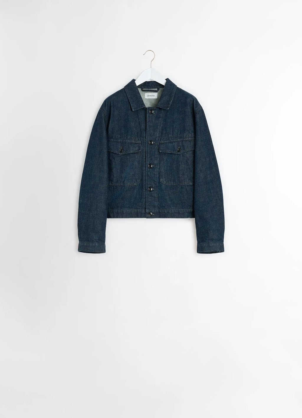 Lemaire Trucker Jacket in Deep Indigo Heavy Denim, product shot, hanging display shot flap chest pockets