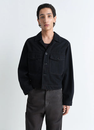 Lemaire Trucker Jacket in Deep Black Heavy Denim, model shot, Front view Boxy shape workwear collar