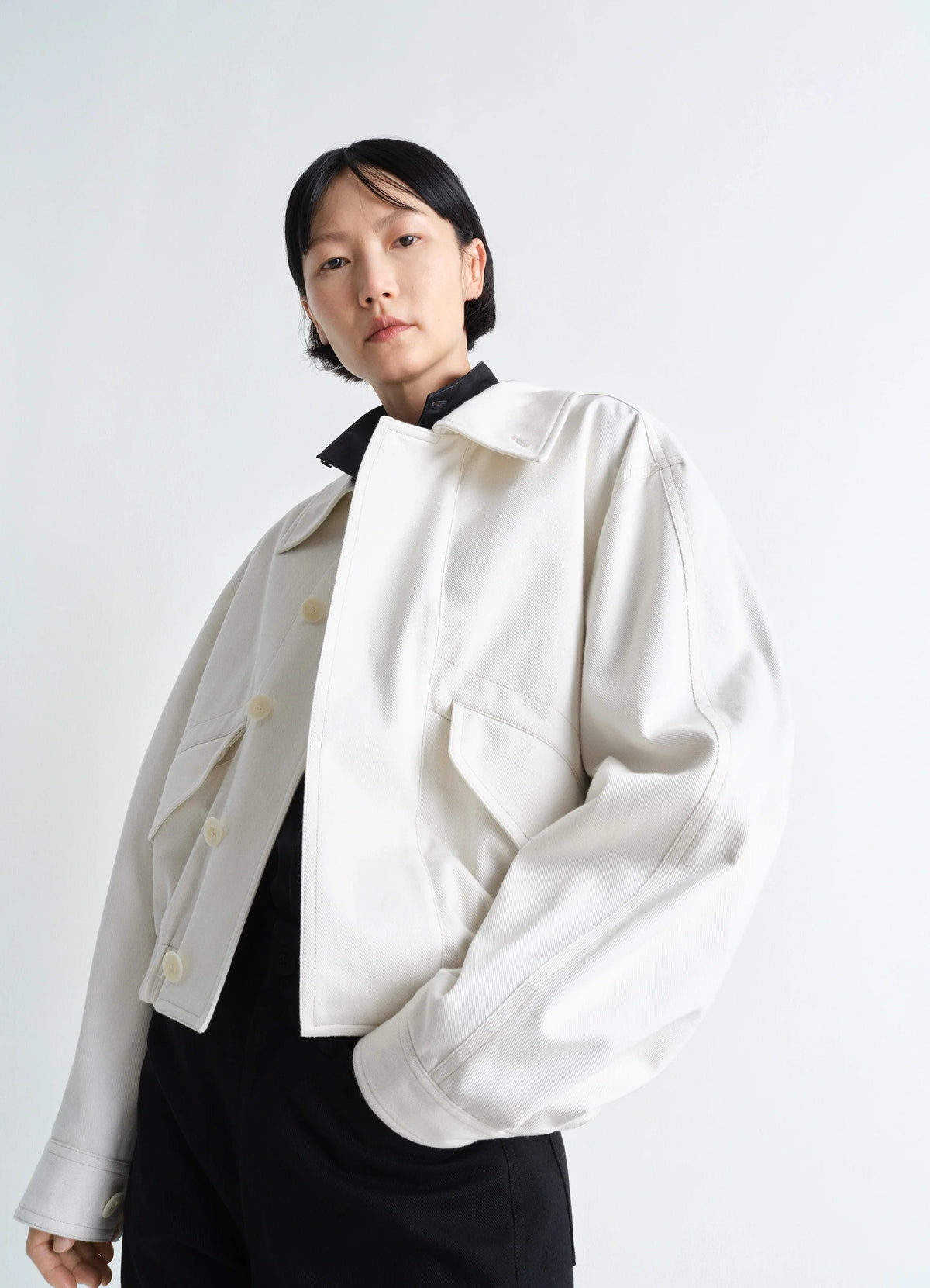 Lemaire Short Blouson in Heavy cotton drill, model shot, Front view Rounded fit, elasticated hem