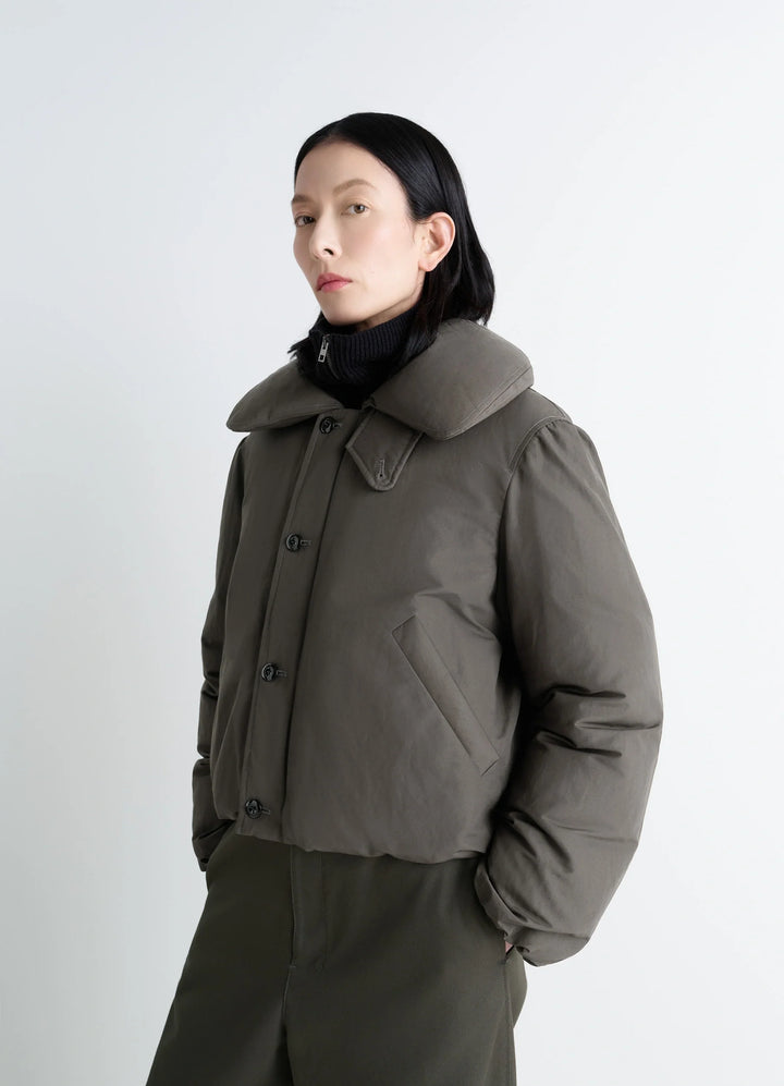 Lemaire Short Puffer Blouson in Linen Cotton Blend, model shot, Side front view Feather-filled, wide collar