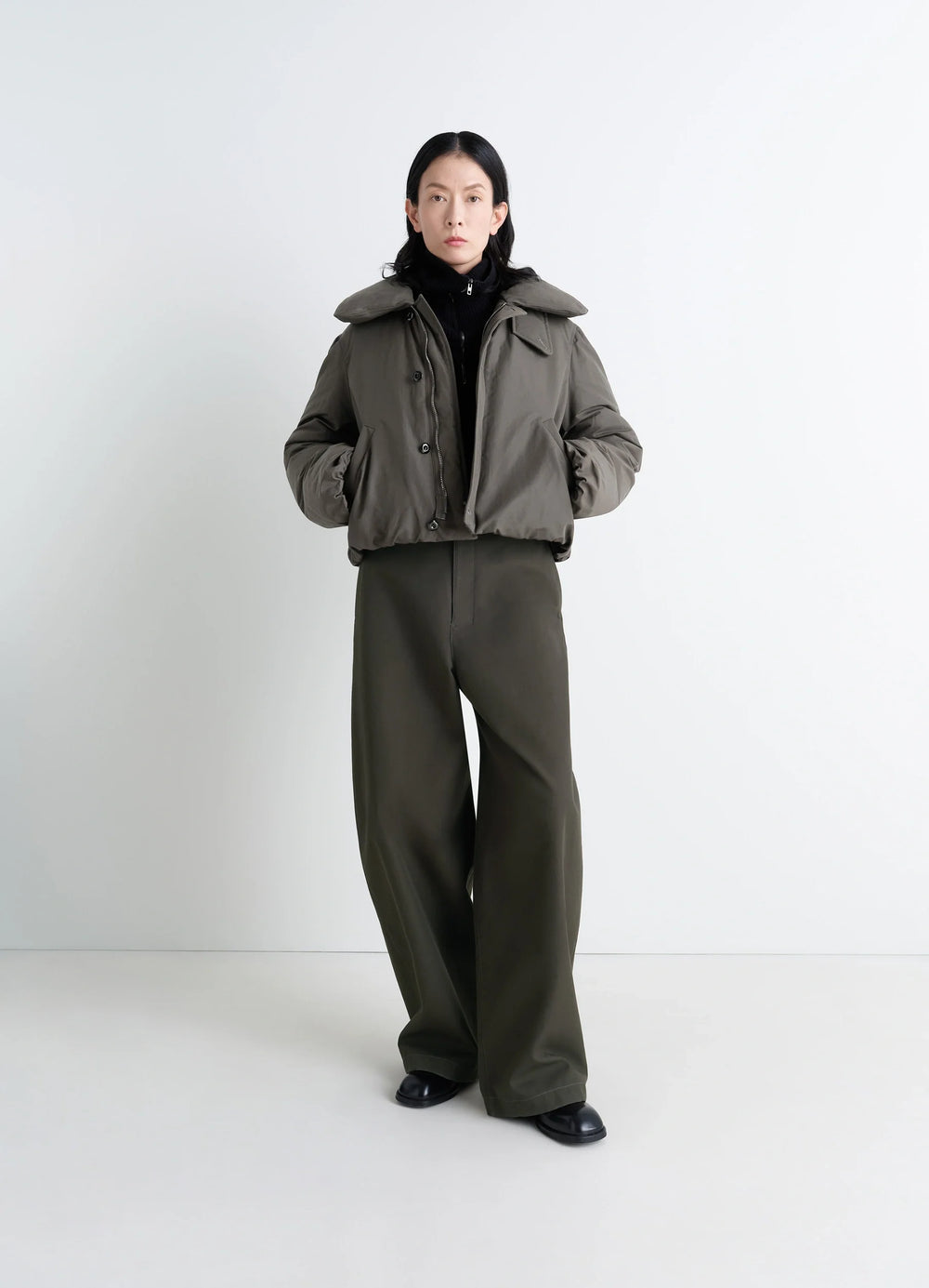 Lemaire Short Puffer Blouson in Linen Cotton Blend, model shot, front view buttoned closure, pockets